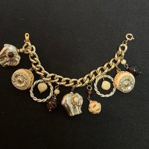 Charm Bracelet With African Theme Of Drums And Elephants Made Of Metal & Plastic